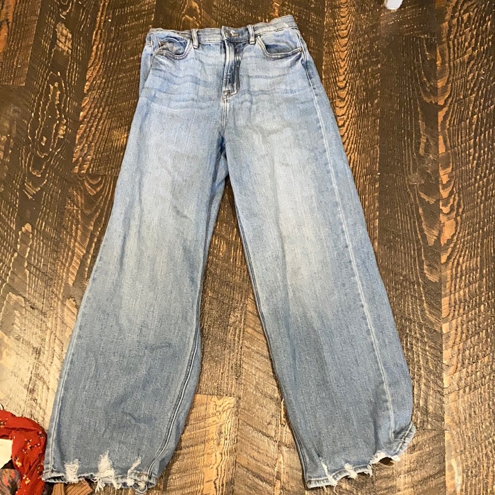 Wide leg jeans with fringe at bottom